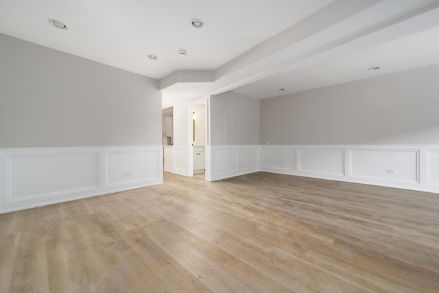 unfurnished room featuring light hardwood / wood-style floors