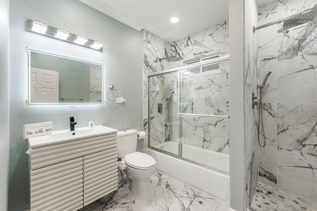 full bathroom featuring crown molding, vanity, bath / shower combo with glass door, and toilet