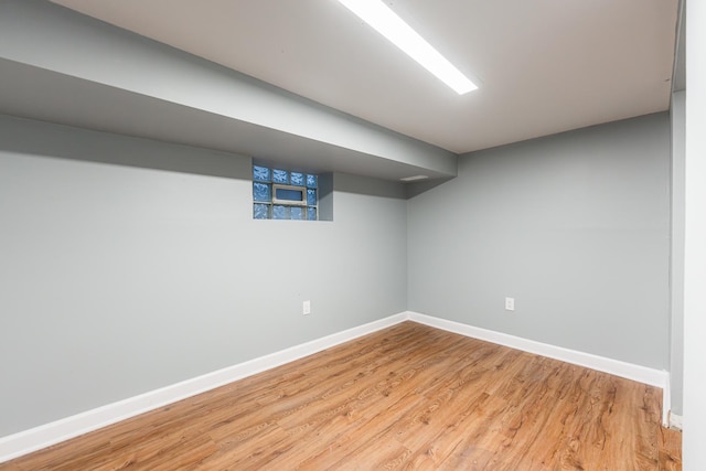 basement featuring light hardwood / wood-style floors