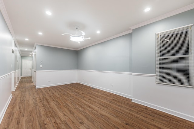 unfurnished room with hardwood / wood-style floors and ornamental molding