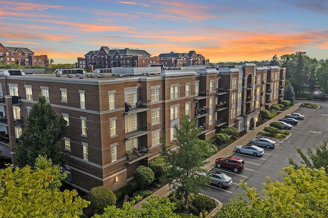 view of outdoor building at dusk