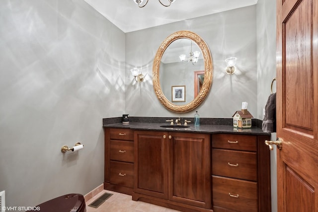 bathroom with vanity and tile patterned floors