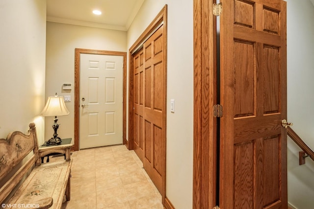 corridor featuring crown molding