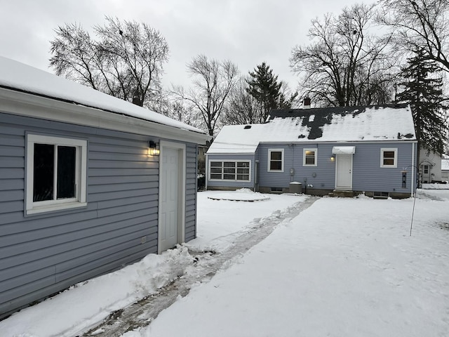 view of snow covered house