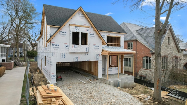 328 S Loomis St, Naperville, IL 60540 - property under construction with a shingled roof, brick siding, and an attached garage