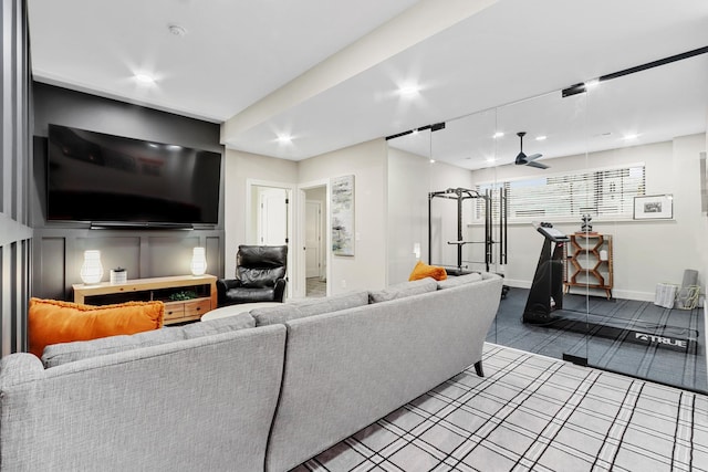 living room with recessed lighting, a ceiling fan, and baseboards