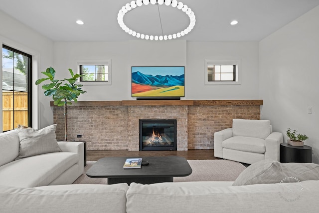 328 S Loomis St, Naperville, IL 60540 - living room with wood finished floors, recessed lighting, and a brick fireplace