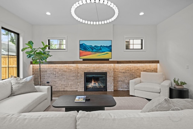 328 S Loomis St, Naperville, IL 60540 - living room featuring wood finished floors, recessed lighting, and a fireplace