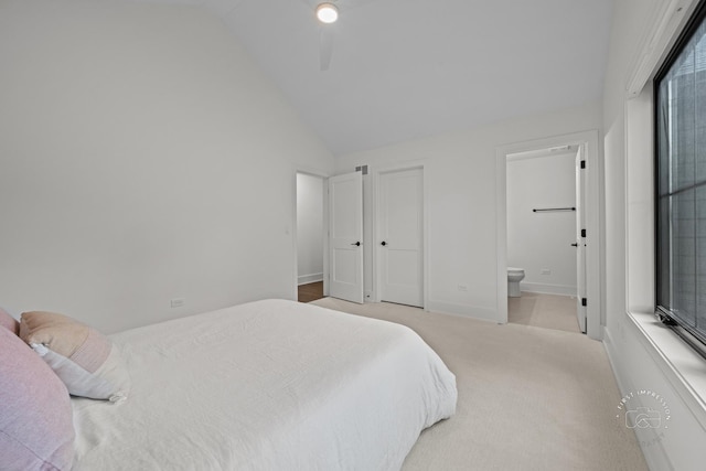 328 S Loomis St, Naperville, IL 60540 - carpeted bedroom featuring lofted ceiling, connected bathroom, and a ceiling fan