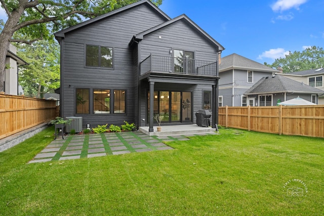 328 S Loomis St, Naperville, IL 60540 - back of property with a balcony, a fenced backyard, and a patio