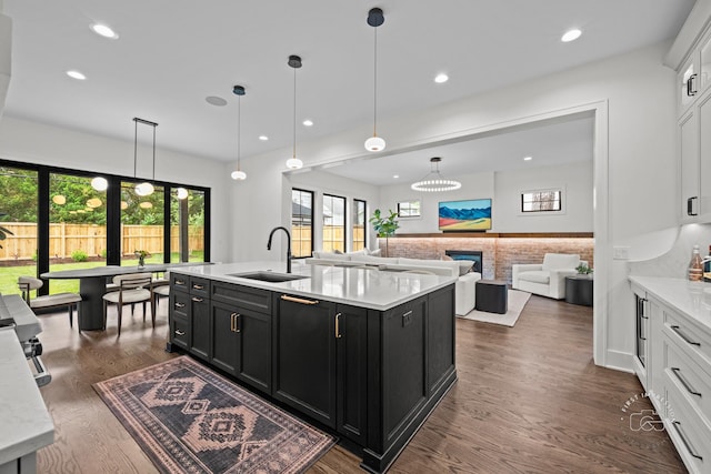 328 S Loomis St, Naperville, IL 60540 - kitchen with dark cabinetry, light countertops, white cabinetry, plenty of natural light, and recessed lighting