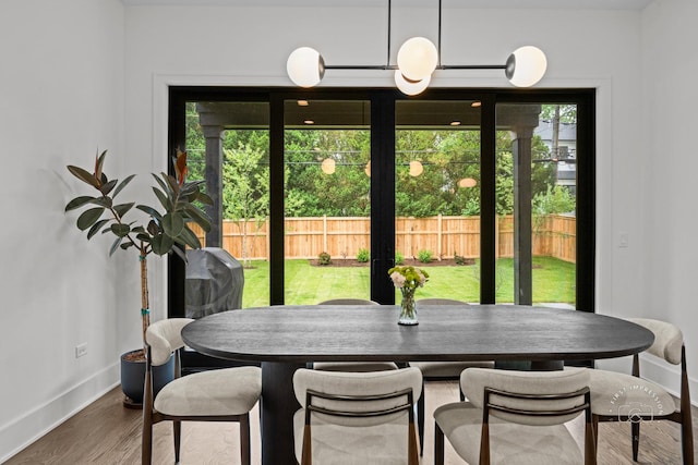 328 S Loomis St, Naperville, IL 60540 - dining space with baseboards and wood finished floors