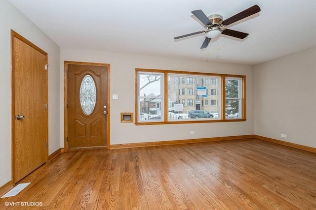 entrance foyer featuring light hardwood / wood-style floors and ceiling fan