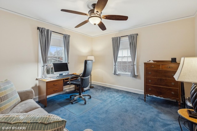 carpeted office featuring ornamental molding, a wealth of natural light, and ceiling fan