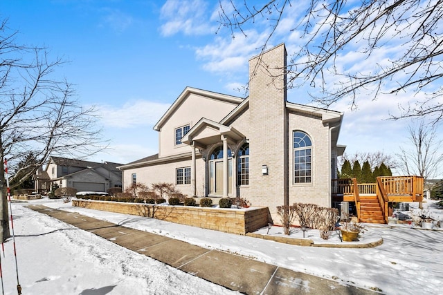 view of front of house featuring a wooden deck