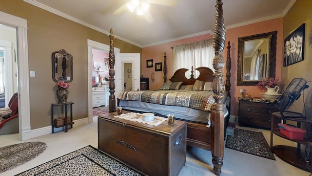 carpeted bedroom with ceiling fan and ornamental molding