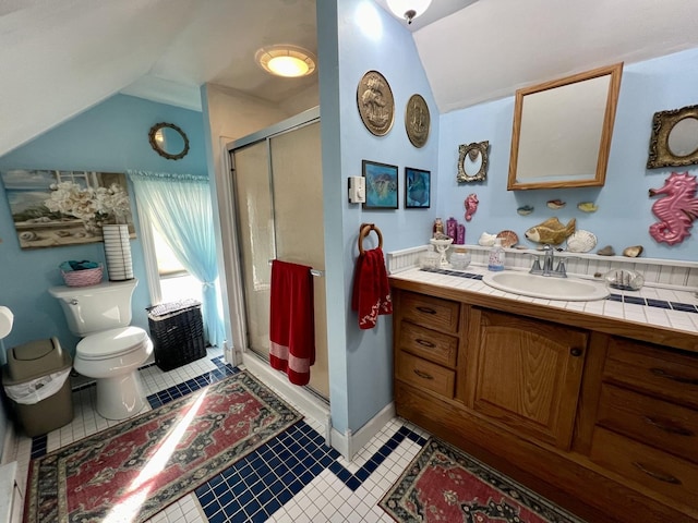 bathroom with toilet, an enclosed shower, tile patterned floors, vanity, and vaulted ceiling