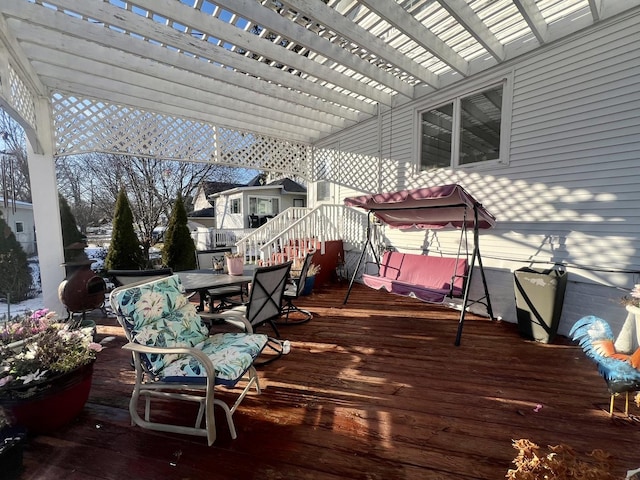 wooden deck with a pergola