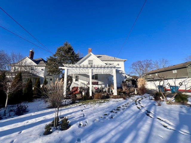 exterior space with a pergola