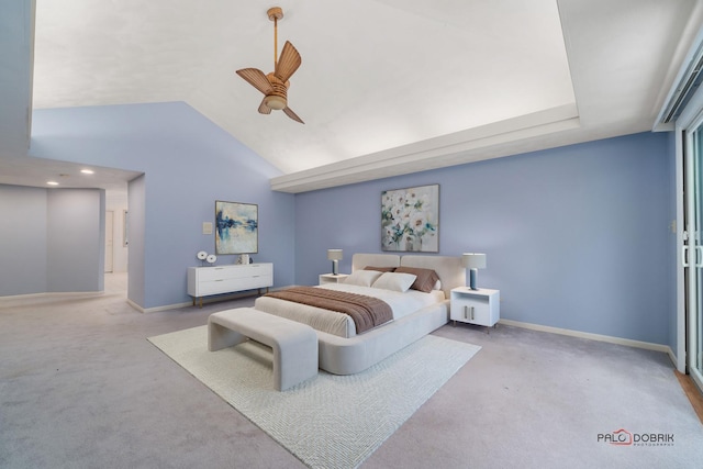 carpeted bedroom featuring ceiling fan and vaulted ceiling