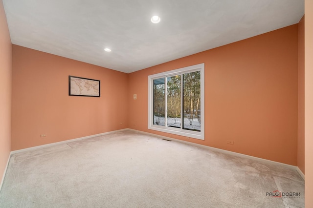 view of carpeted spare room