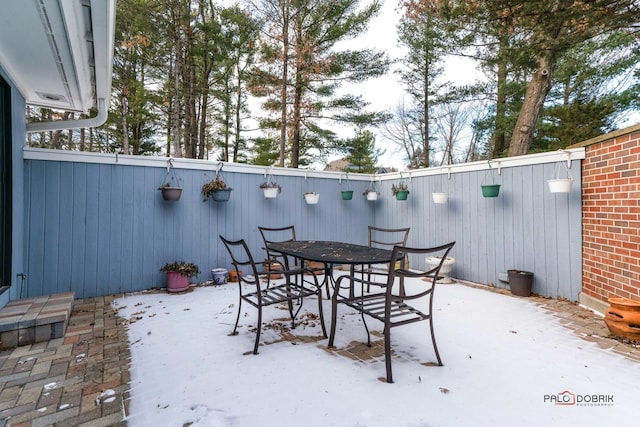 view of snow covered patio