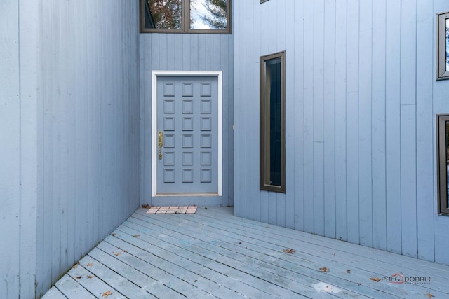 doorway to property with a deck