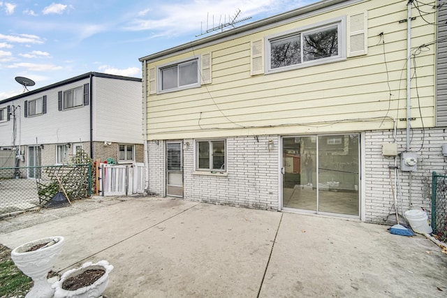 back of house featuring a patio area