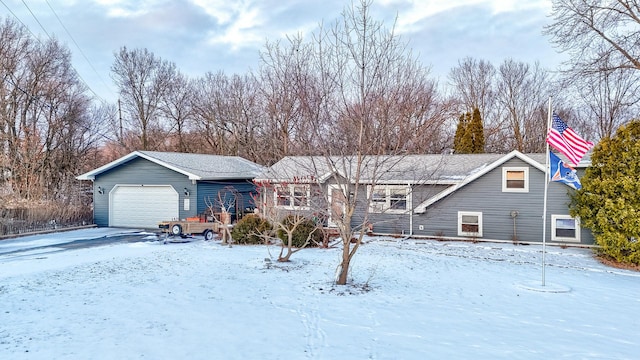 view of front of property with a garage