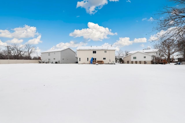 view of snow covered house