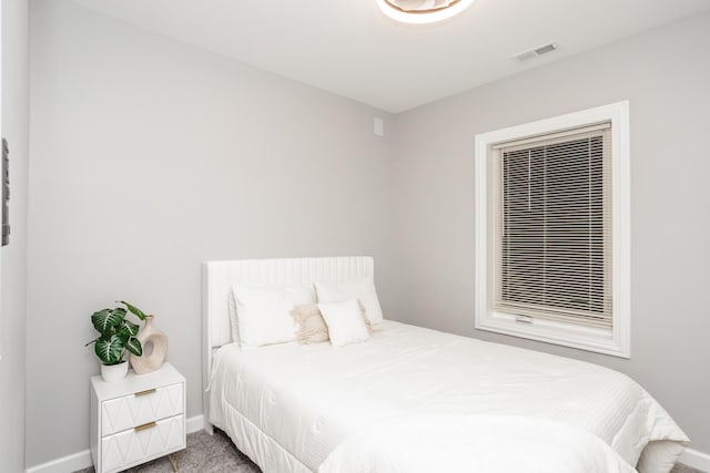 bedroom featuring carpet