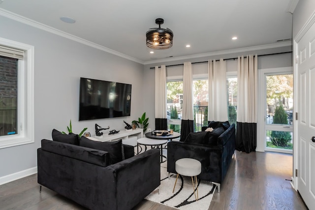 living room featuring hardwood / wood-style floors and ornamental molding