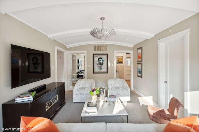 living room featuring dark colored carpet, lofted ceiling, and an inviting chandelier