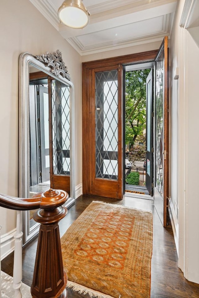 entrance foyer featuring dark hardwood / wood-style floors and crown molding