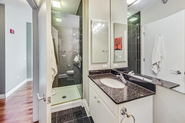 bathroom featuring vanity and walk in shower