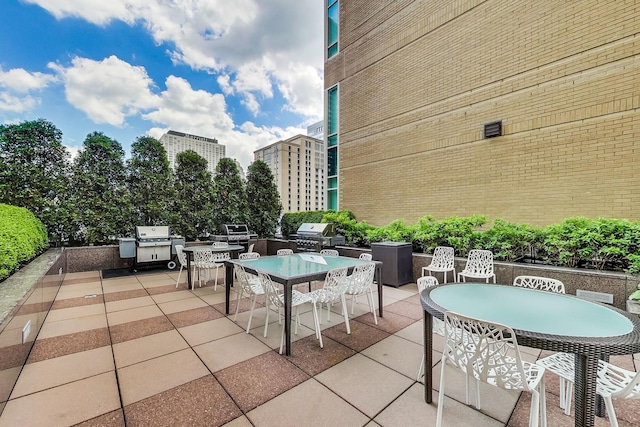 view of patio with a grill