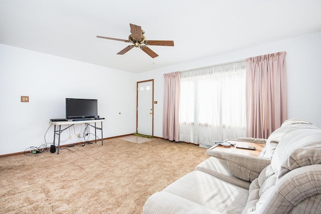 living room featuring ceiling fan and light colored carpet