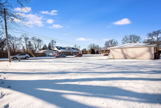 view of yard covered in snow