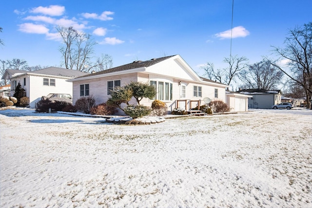 view of snow covered house