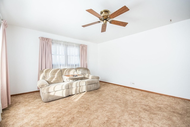 living room featuring ceiling fan and light carpet