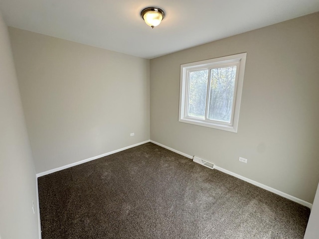 empty room featuring carpet floors