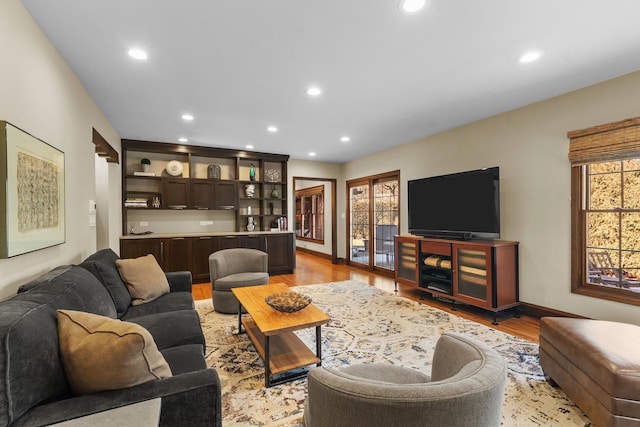 living room with light hardwood / wood-style floors