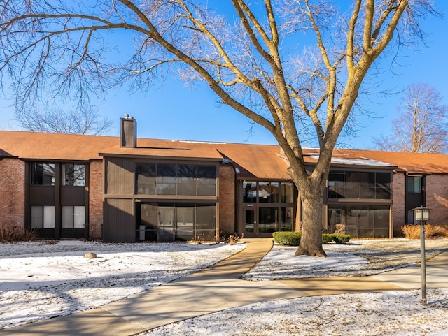 view of snow covered building