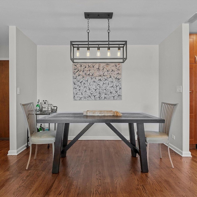 dining area featuring hardwood / wood-style floors