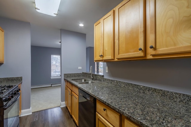 kitchen with a baseboard heating unit, black appliances, sink, dark stone countertops, and dark hardwood / wood-style flooring