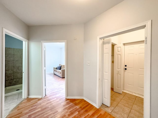 hallway featuring light hardwood / wood-style floors