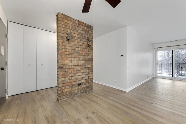 interior space with ceiling fan and light hardwood / wood-style floors