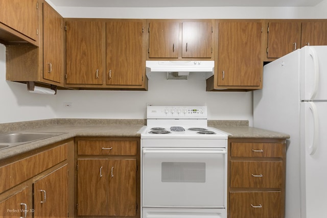 kitchen featuring white appliances