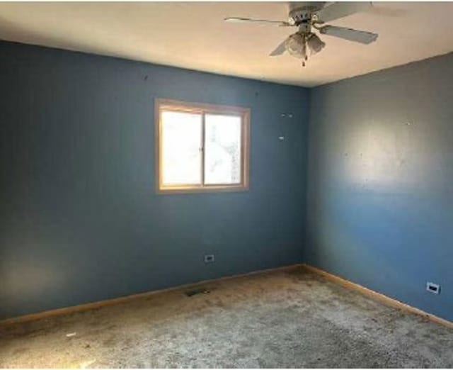 3710 Briar Ln, Hazel Crest, IL 60429 - carpeted spare room with baseboards and a ceiling fan