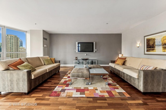 living room with dark hardwood / wood-style floors